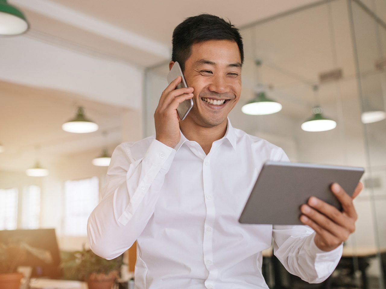 Happy man talking with phone